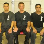 Wing Chun Sifu with Two Students